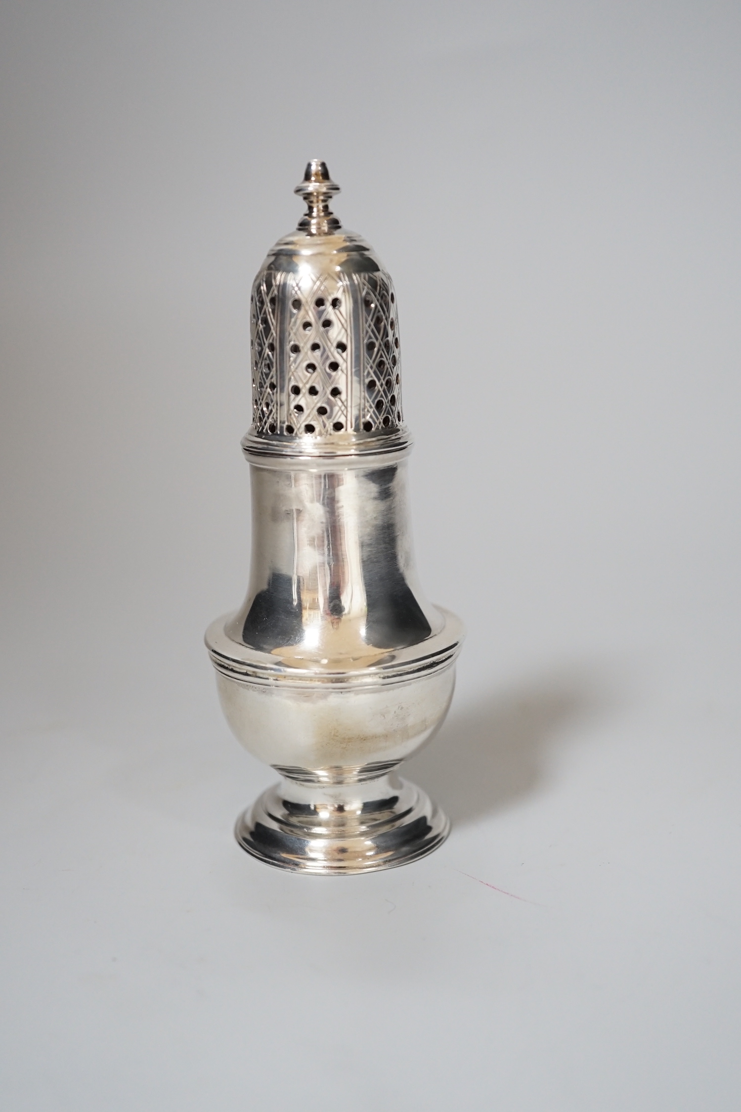 A George II silver baluster caster, makers mark obscured, London 1758, 11cm, 81 grams